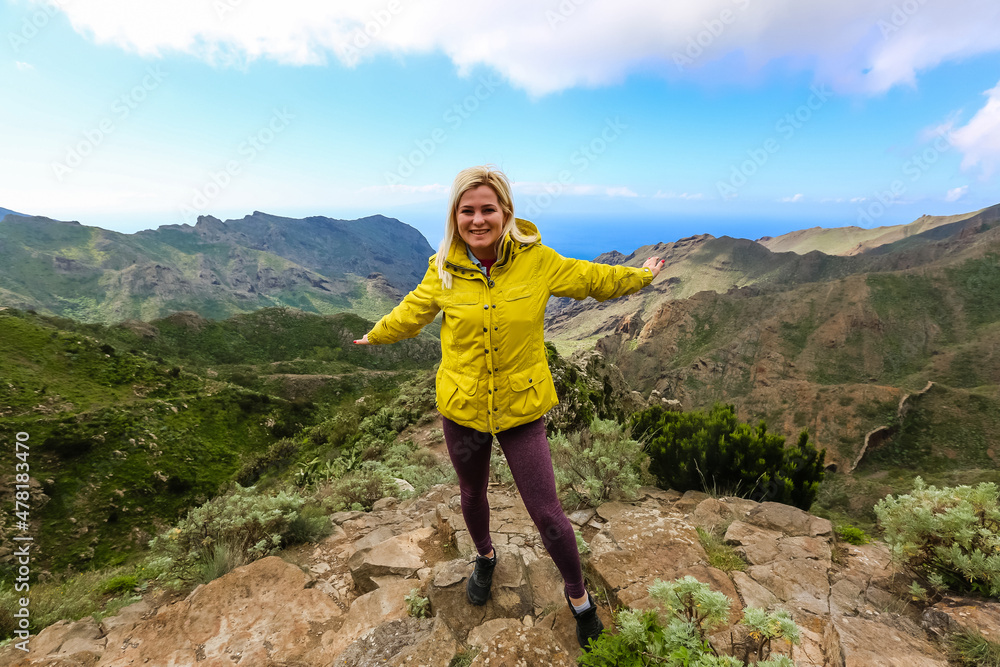 woman on Mountain village Masca on Tenerife, Spain. Tenerife landmark landscape woman on Mountain village Masca on Tenerife, Spain. Tenerife landmark landscape