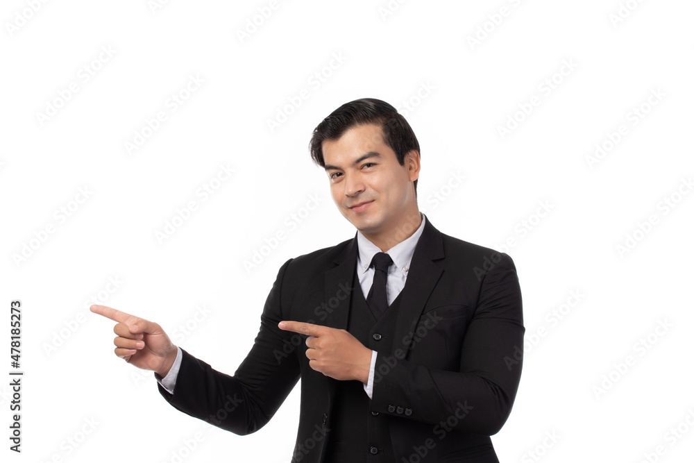 Portrait of a confident business man in black suit smile and pointing to copy space isolated on white background. Portrait business concept. Portrait of a confident business man in black suit smile and pointing to copy space isolated on white background. Portrait business concept.