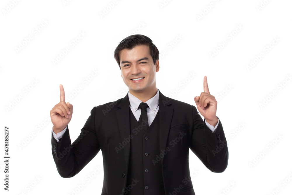 Portrait of a confident business man in black suit smile and pointing to copy space isolated on white background. Portrait business concept. Portrait of a confident business man in black suit smile and pointing to copy space isolated on white background. Portrait business concept.