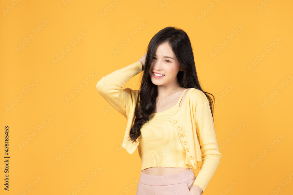 Portrait of beautiful young Asian girl model long hair in casual summer clothes smile, happy and enjoying in studio isolated on white background. Portrait of beautiful young Asian girl model long hair in casual summer clothes smile, happy and enjoying in studio isolated on white background.