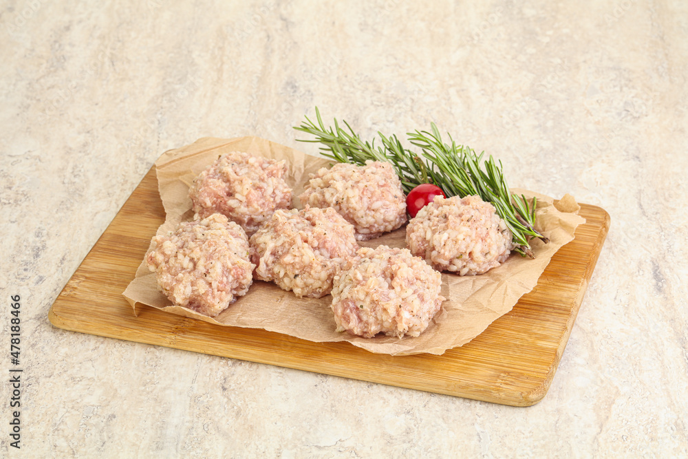 Traditional homemade raw pork meatballs Traditional homemade raw pork meatballs