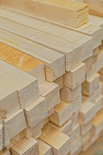 Stacked wood in the sawmill close up