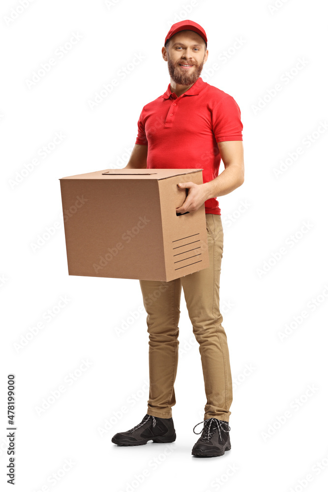 Full length shot of a delivery man carrying a cardboard box Full length shot of a delivery man carrying a cardboard box