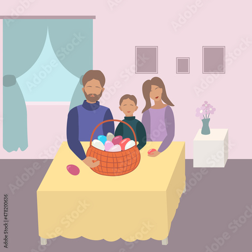 A family at a table and a basket of eggs. Bearded dad, son and mom