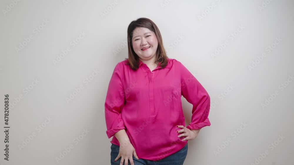 Fat woman pink shirt, Obese woman happy and smile belly fat isolated on clean background, Overweight fatty belly of woman diet lifestyle overweight Happy and self-esteem concept. Fat woman pink shirt, Obese woman happy and smile belly fat isolated on clean background, Overweight fatty belly of woman diet lifestyle overweight Happy and self-esteem concept.