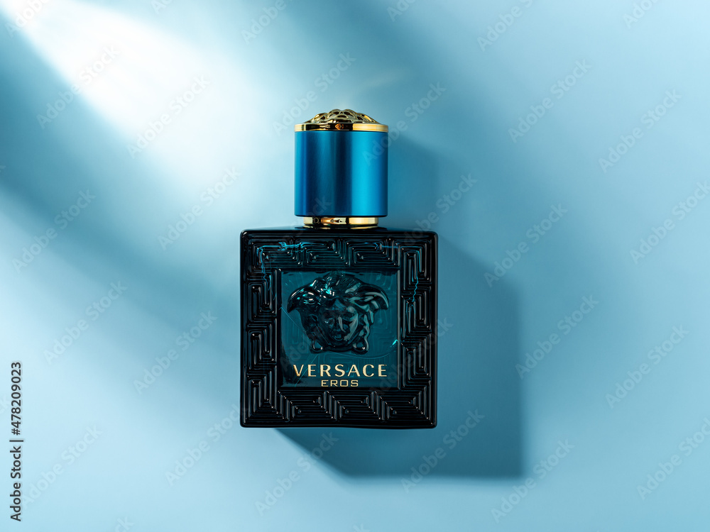 Varna, Bulgaria, January 03, 2022. Versace Eros perfume in a rectangular  glass bottle on a blue background. Stylish men perfume produced by Gianni  Versace luxury fashion company. Stock Photo | Adobe Stock