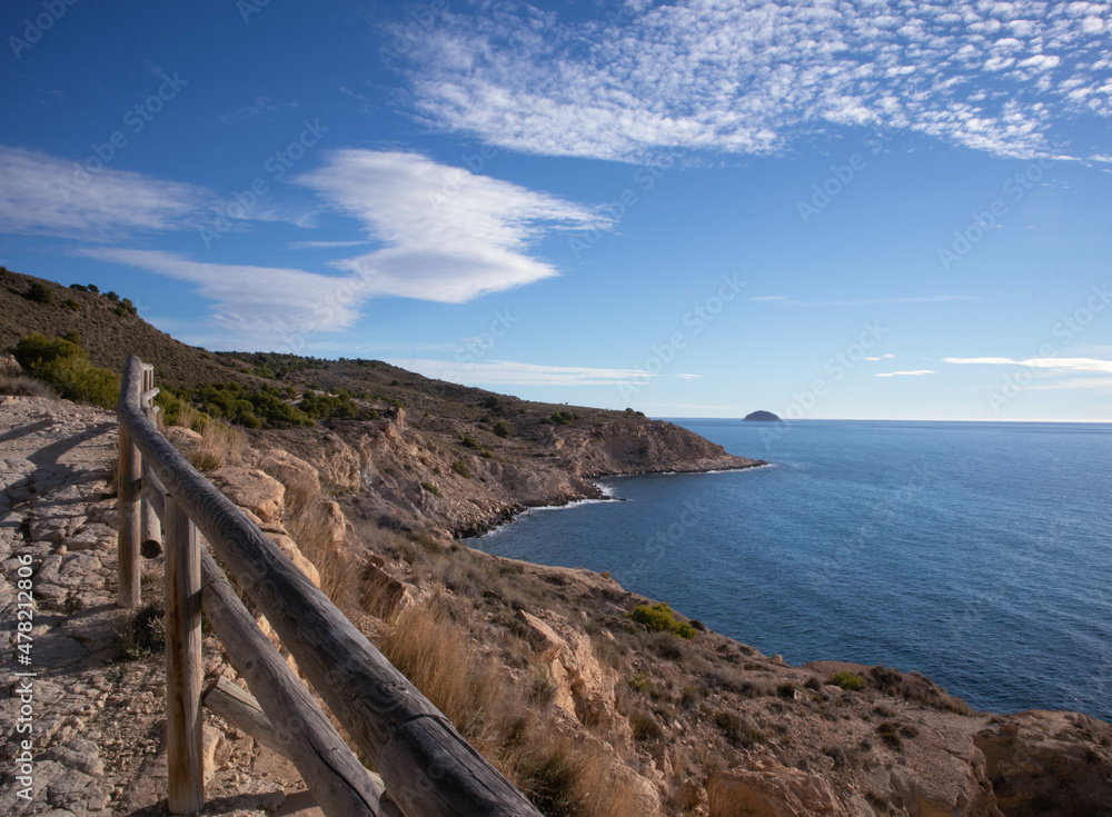 a beautiful coastline, beach, coves and cliffs in Villajoyosa, Alicante, Spain. Walking for the mountain route.