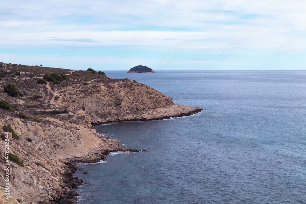 a beautiful coastline, beach, coves and cliffs in Villajoyosa, Alicante, Spain. Walking for the mountain route.