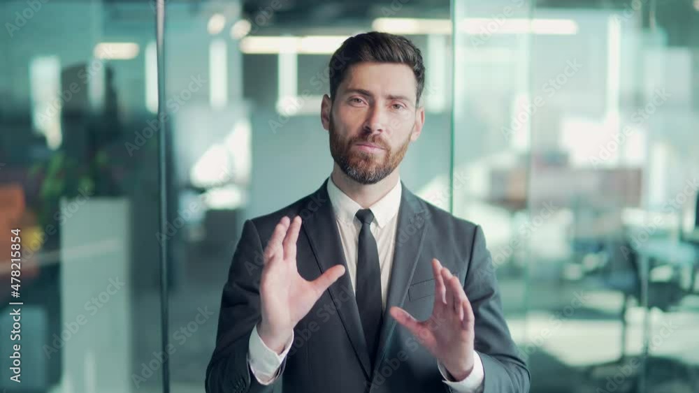 Portrait Caucasian business man speaker in suit talking looking at camera. Online meeting, conference, advice, distance learning, remotely consult training via video call in office class. Webcam view Portrait Caucasian business man speaker in suit talking looking at camera. Online meeting, conference, advice, distance learning, remotely consult training via video call in office class. Webcam view