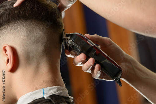 Εκτύπωση καμβά Close up of hair clipper. Person getting a haircut