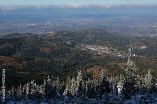 Winter in the forest. Panoramic view of a small town in the mountains © Yevhen