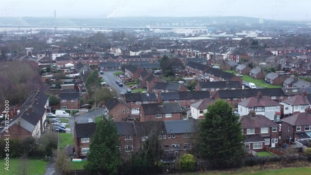 Aerial view rows northern England terraced town houses residential neighbourhood in overcast winter season dolly shot left Aerial view rows northern England terraced town houses residential neighbourhood in overcast winter season dolly shot left
