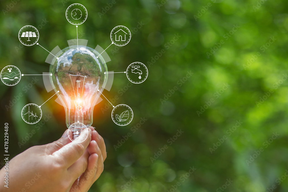 Light bulb Energy saving green nature background Light bulb Energy saving green nature background