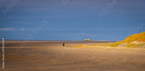The beach and Wadden Sea of St Peter Ording in Germany is a popular tourist attraction - travel photography