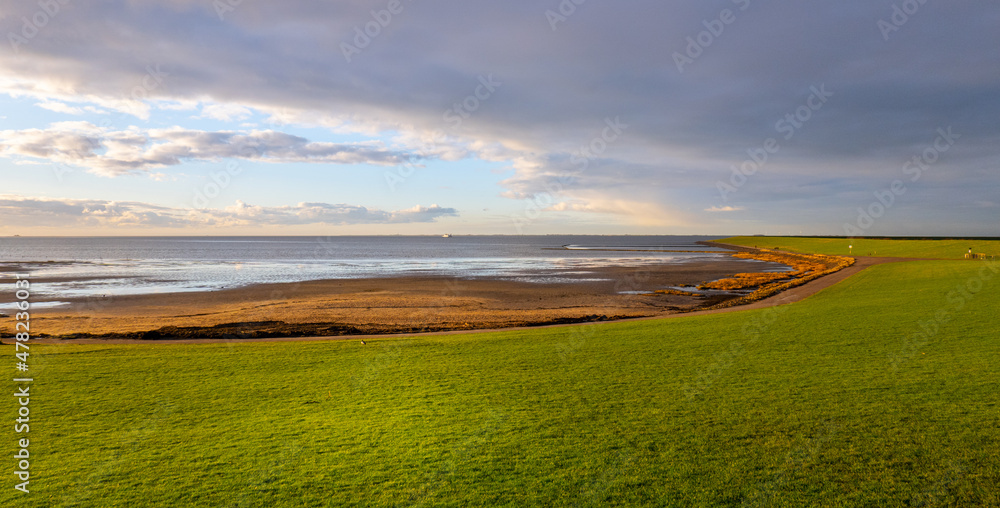 The beautiful landscape of Nordstrand Germany at the Wadden Sea - drone photography Germany from above The beautiful landscape of Nordstrand Germany at the Wadden Sea - drone photography Germany from above