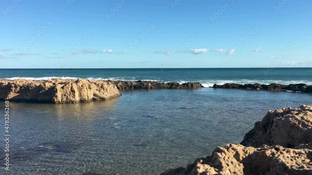 Waves Crashing in Rock Pools in the Sea Waves Crashing in Rock Pools in the Sea