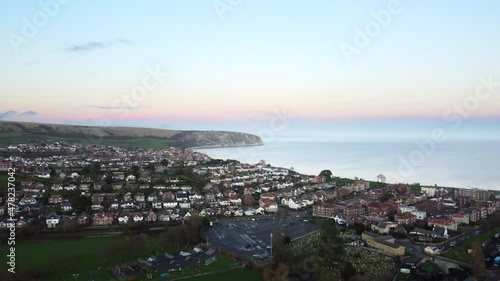 Drone shot flying over Swanage Town on the Jurassic Coast in England photo