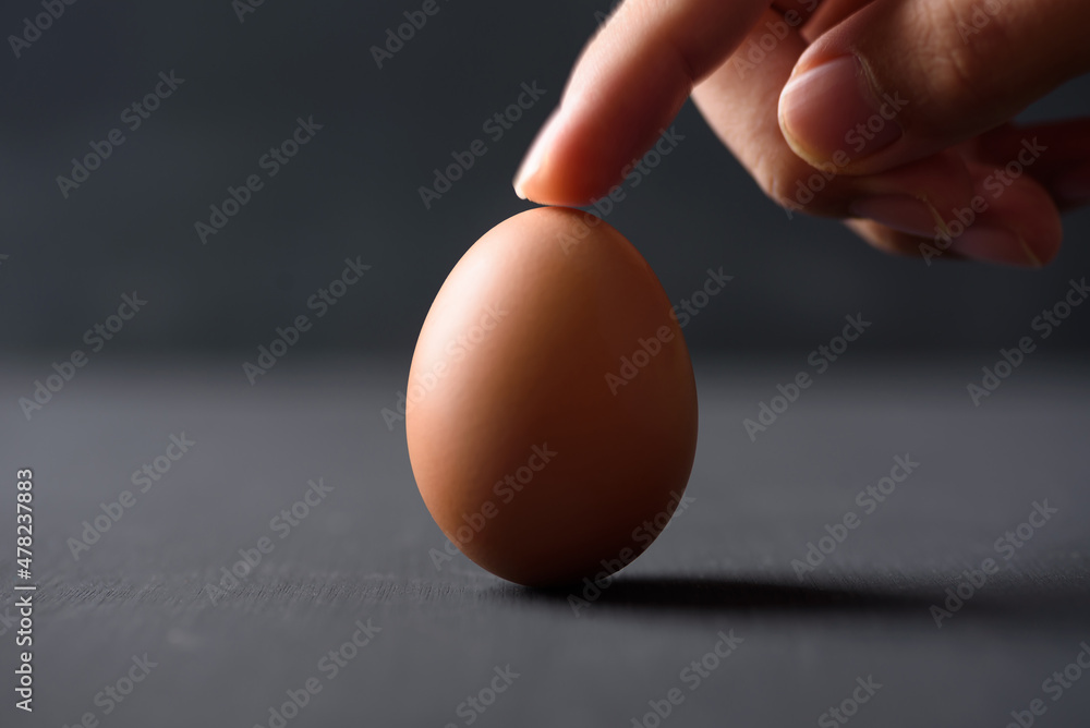 Fresh organic chicken eggs on black background Fresh organic chicken eggs on black background