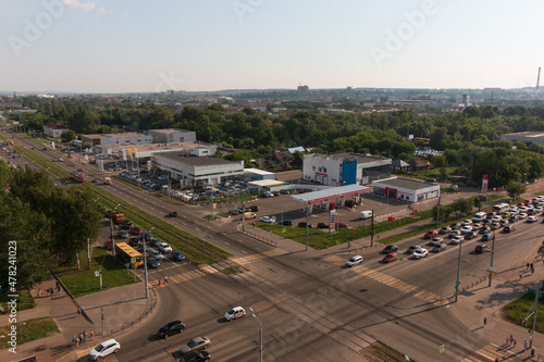 daytime city street in summer road with cars