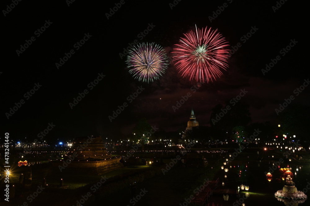 Fireworks near the old pagoda on the celebration Loy Krathong festival at the Wat Mahathat Temple in Sukhothai Historical Park. It is a tradition that has been around since ancient times
Fireworks near the old pagoda on the celebration Loy Krathong festival at the Wat Mahathat Temple in Sukhothai Historical Park. It is a tradition that has been around since ancient times