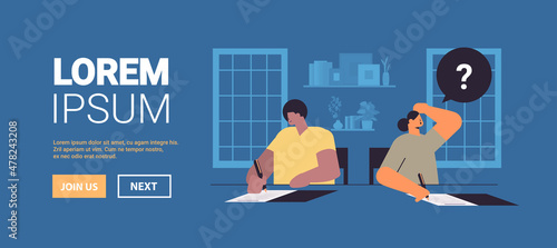 mix race students having exam writing test education learning process concept classroom interior