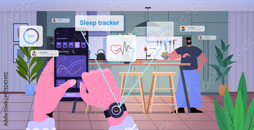 people using electronic smart watch app tracker on hand quality and quantity sleep control concept kitchen interior