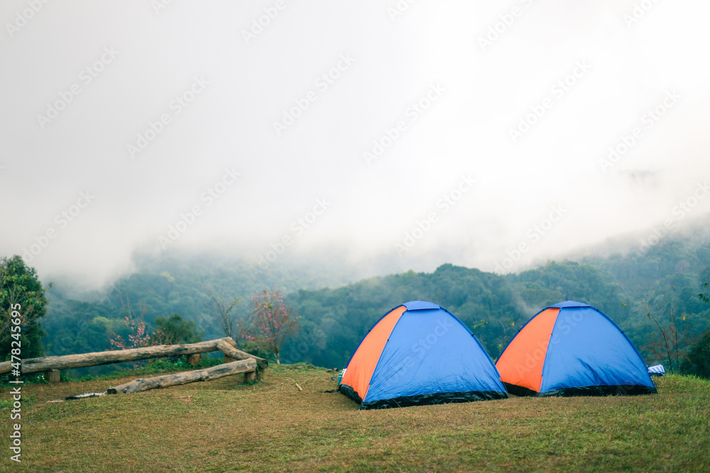 landscape tent  in  morning mist  winter season background
