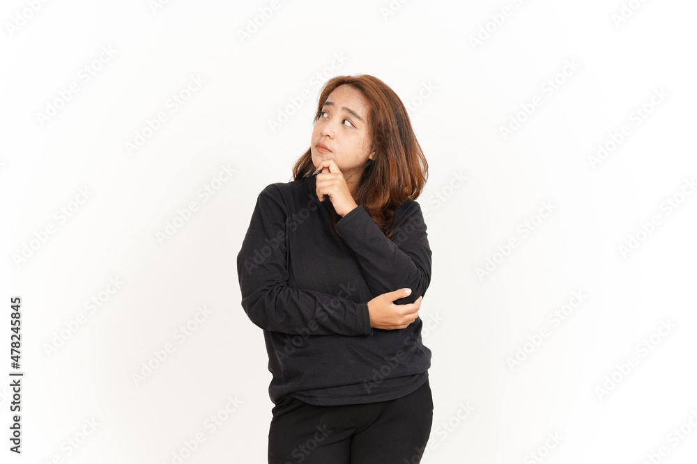 Thinking Gesture Of Beautiful Asian Woman Wearing Black Shirt Isolated On White Background Thinking Gesture Of Beautiful Asian Woman Wearing Black Shirt Isolated On White Background