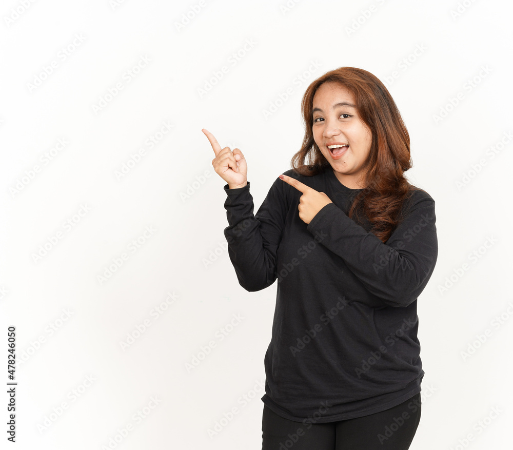 Pointing Aside Of Beautiful Asian Woman Wearing Black Shirt Isolated On White Background Pointing Aside Of Beautiful Asian Woman Wearing Black Shirt Isolated On White Background