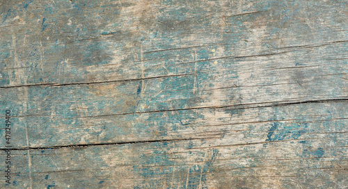 Weathered blue with green and brown wood sheet, Old wooden boards with crack on the plank surface