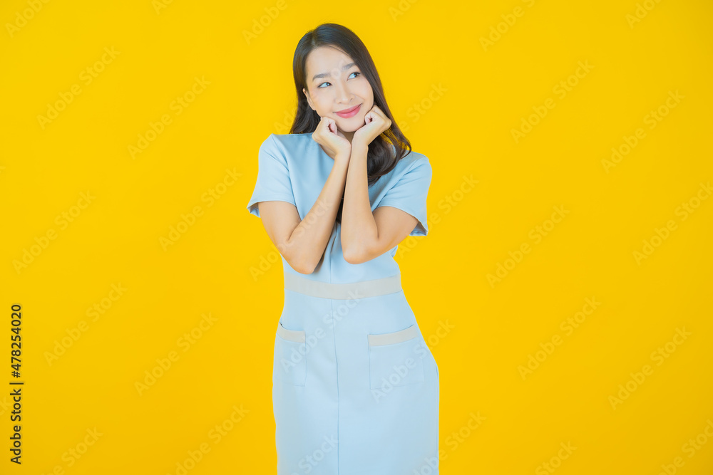 Portrait beautiful young asian woman smile with action Portrait beautiful young asian woman smile with action