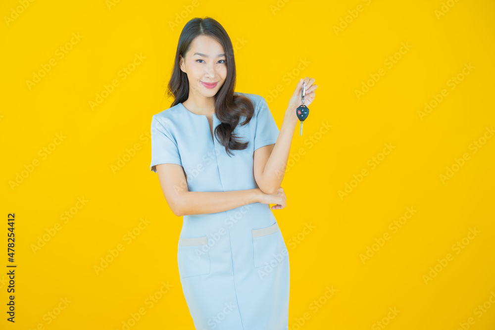 Portrait beautiful young asian woman smile with car key Portrait beautiful young asian woman smile with car key