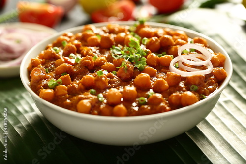 Chana masala- Indian traditional chickpeas curry with exotic spices and herbs.