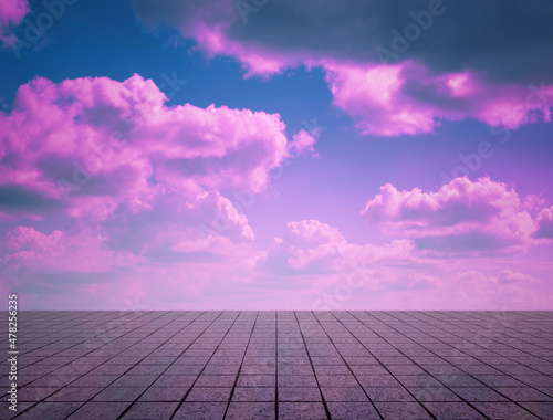 pink clouds, blue sky, gray floor.