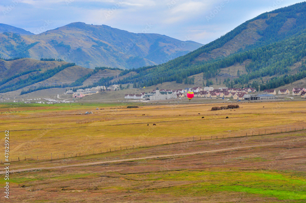 Obraz premium Mountain and forest, grassland scenery, yurt in xinjiang, China