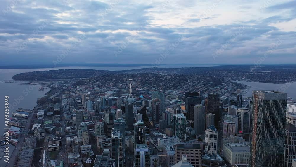 Wide arial view of Seattle with the Puget Sound on the left and Lake Union on the right. Wide arial view of Seattle with the Puget Sound on the left and Lake Union on the right.