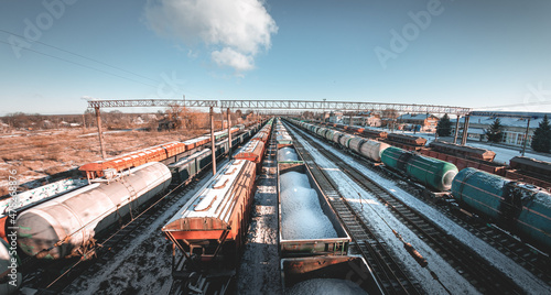 Freight trains from a height at the marshalling yard. Delivery of goods by freight train. Railroad cars at the station