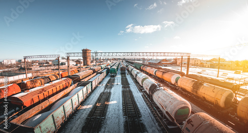 Freight trains from a height at the marshalling yard. Delivery of goods by freight train. Railroad cars at the station