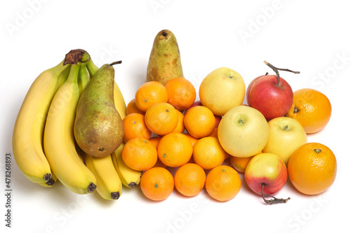 Fresh and ripe fruits on white background, abundance vitamins in fruits of bananas, tangerines, apples and pears.
