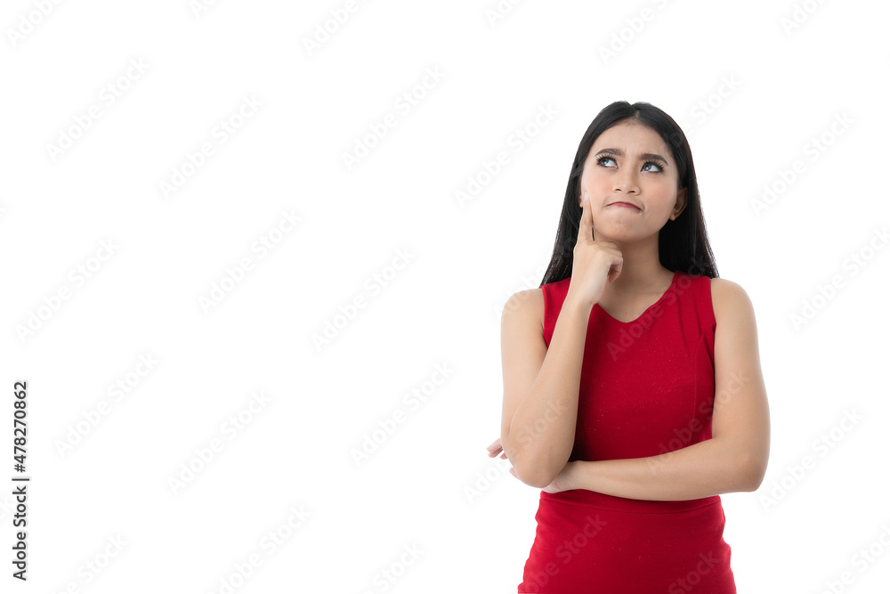 Portrait of beautiful young Asian woman in casual business red dress is looking up, pointing cheek and crossed arm while thinking, imagine something, isolated white background with clipping path. Portrait of beautiful young Asian woman in casual business red dress is looking up, pointing cheek and crossed arm while thinking, imagine something, isolated white background with clipping path.