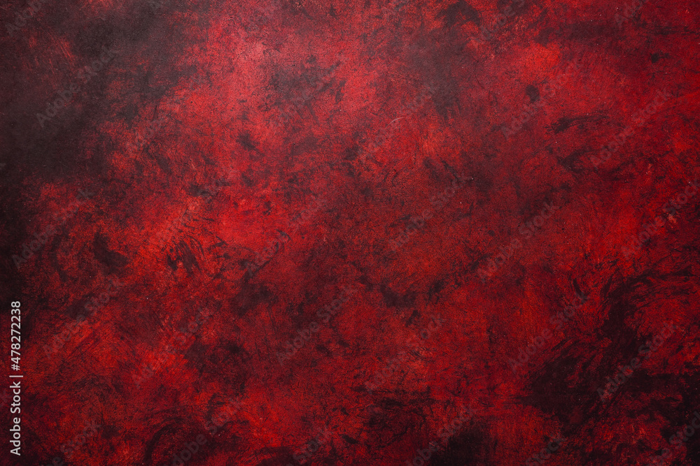 Red weathered wall textured background with garnet tones. Aged wall.
