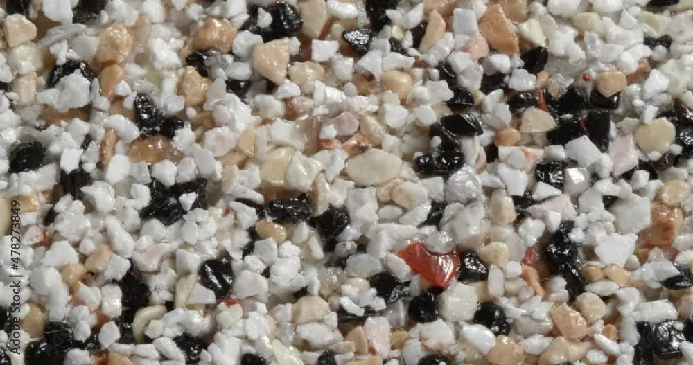 Close-up texture of fine marble chips. Multi color. Close-up texture of fine marble chips. Multi color.