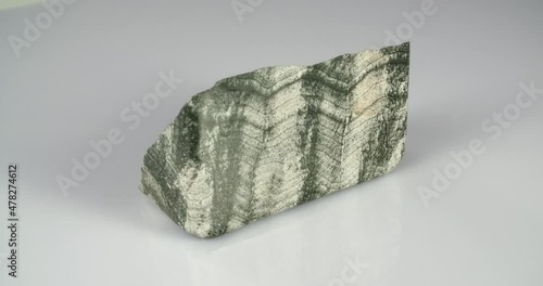 Skarn mineral rotation on white background . Primorsky Krai Russia.