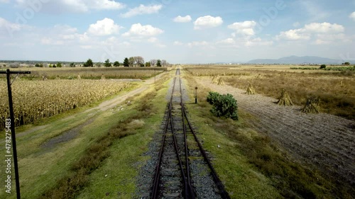 View of railroad corssing countryside photo