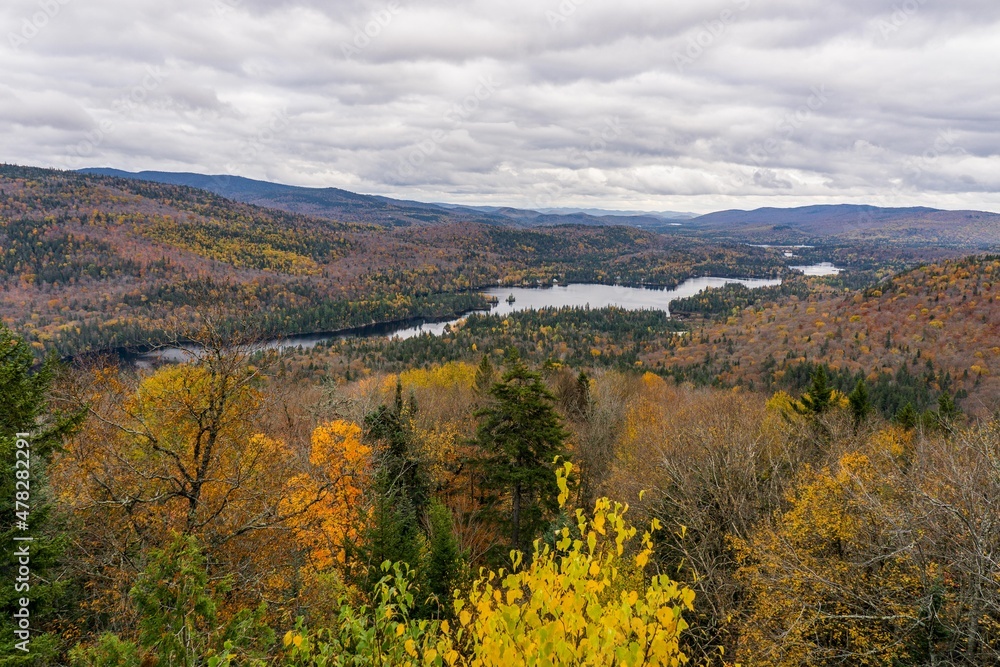 View on the Assomption lake and the Laurentides mountains from the Belvedere at the end of 