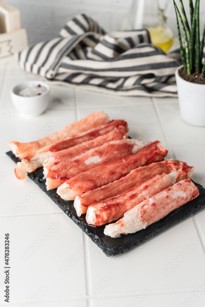 Natural crab meat without additives. Pure product. Serving on a light background Natural crab meat without additives. Pure product. Serving on a light background