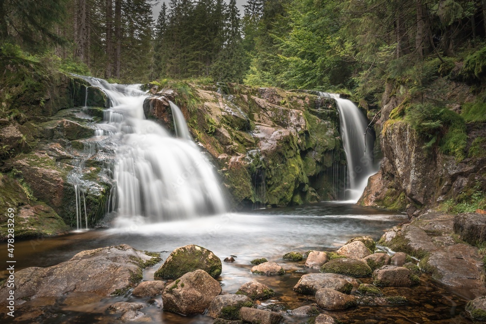 Obraz premium The Elbe river and waterfall in the mountains of Czech Republic