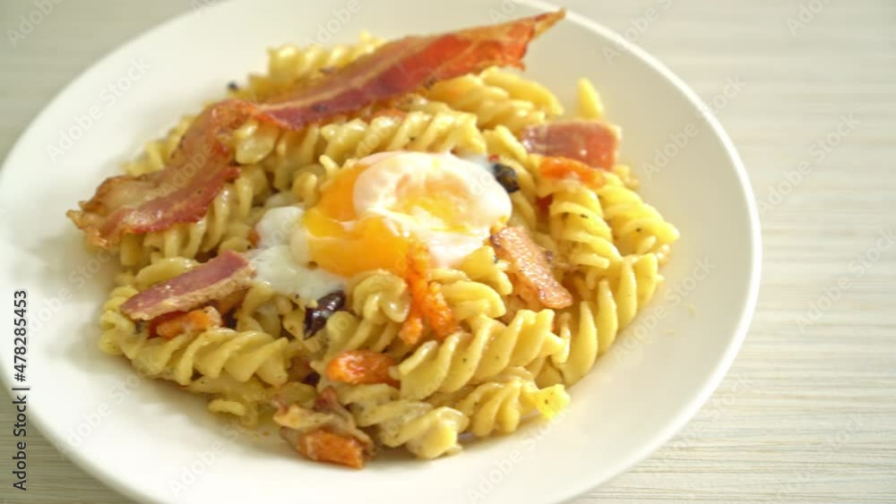 carbonara fusilli pasta spicy bacon - Italian food style carbonara fusilli pasta spicy bacon - Italian food style