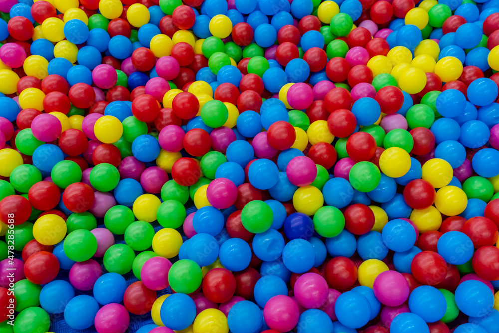 Fototapeta premium A lot of colorful plastic balls in ball pool