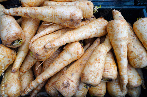 Fresh parsnips at a farmers market